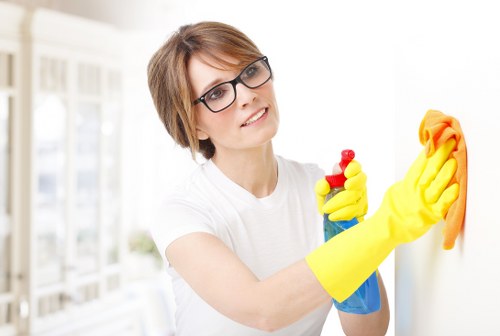 Cleaner checking workspace for slip and trip hazards